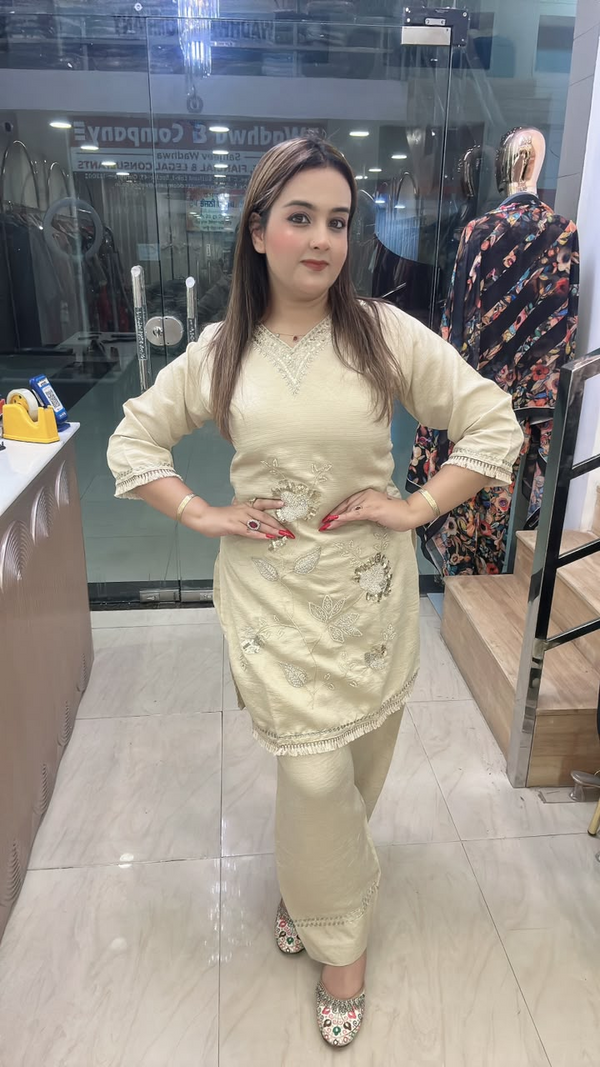 Cream cord set with embroidered floral work and Farshi salwar full pose