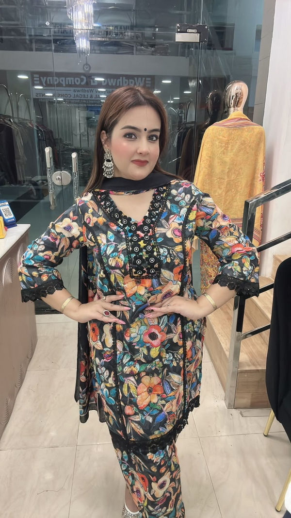 Cotton Farshi suit with floral print and black lace neck detail close front view
