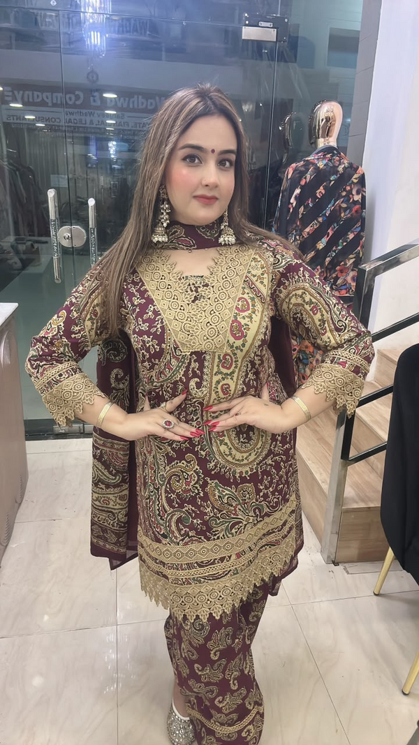 Maroon cotton farshi suit with paisley print and lace work front pose