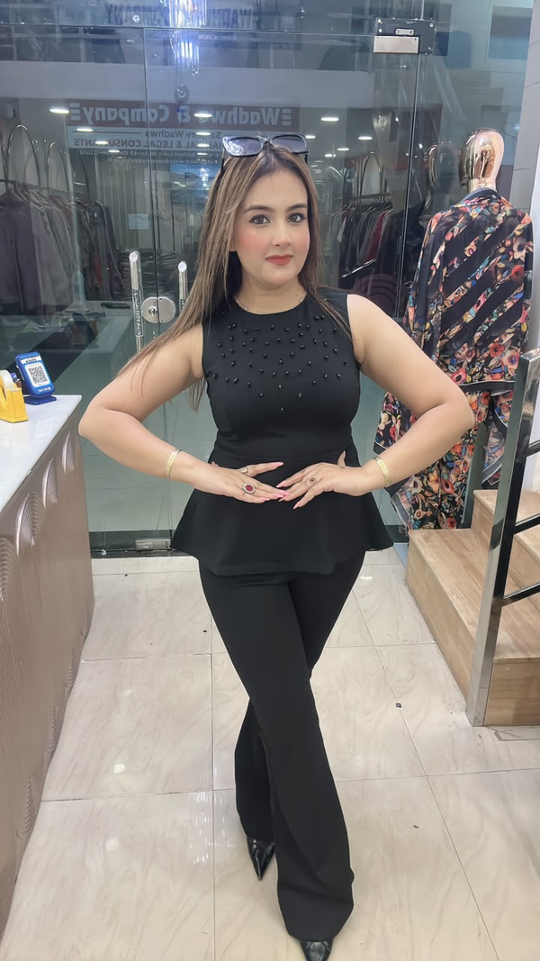 Black lycra cord set with pearl work peplum top and pants full view