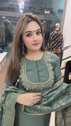 Sage green Dupion silk suit with embroidered neckline and Banarasi dupatta close view