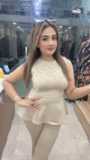 Beige lycra cord set with pearl work sleeveless top close view