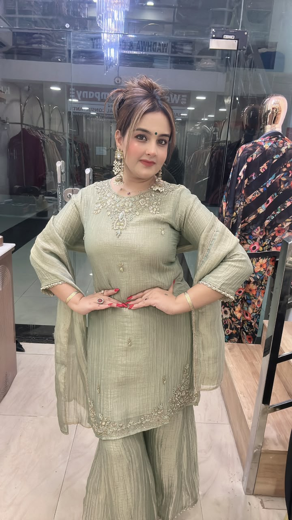 Sage green party wear gharara suit with embroidery and dupatta front pose