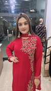 Red pure Chinon suit with embroidered neckline close view