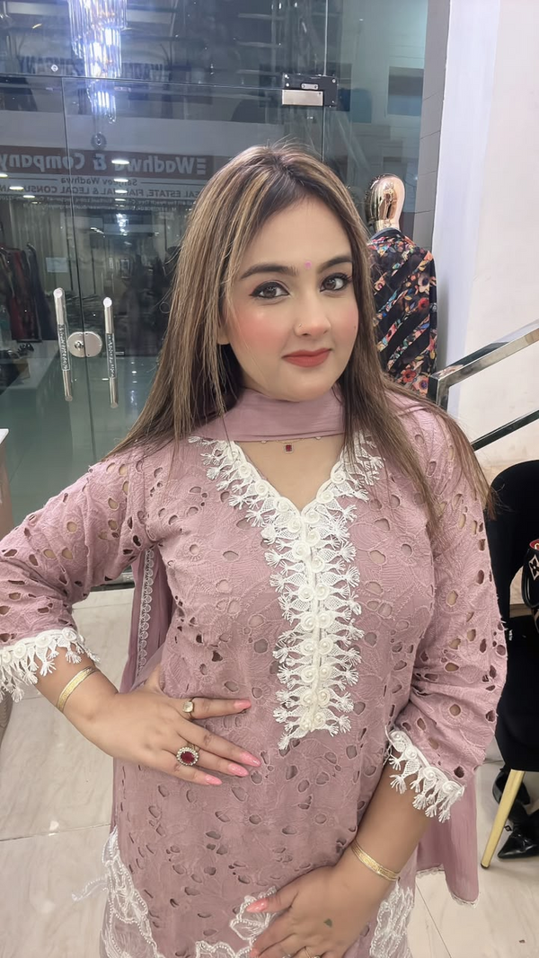 Dusty pink Shiffli cotton suit with white lace neckline close view