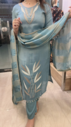 Blue shimmer crape suit with leaf embroidery work close view